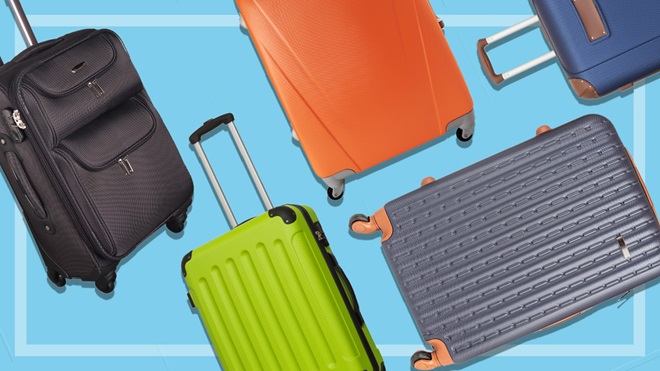 different sized suitcases on a blue background
